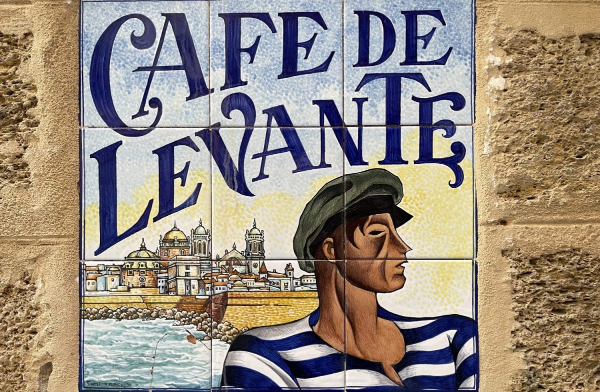 Glazed tiles depicting Cadiz, Spain, with a sailor and a Cafe De Levante header text.