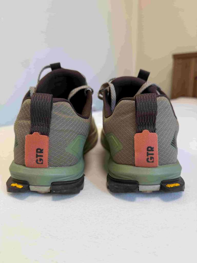 A rear-view image of a pair of ALTRA LONE PEAK 9+ trekking shoes