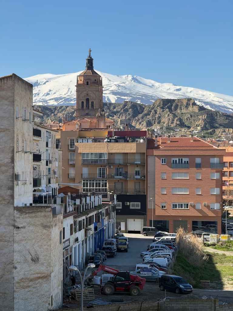 Guadix in March, with the Sierra Nevada as a snow-topped backdrop